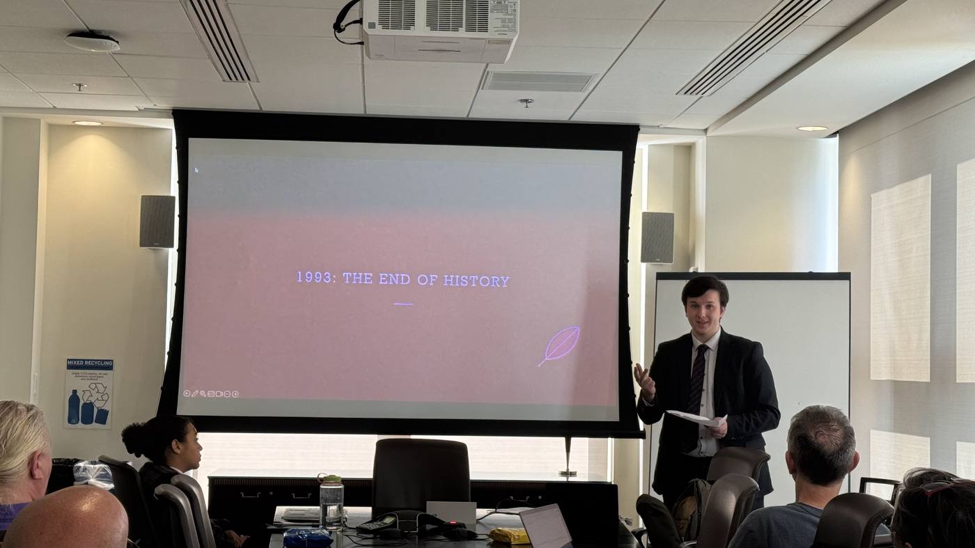 Mohammed Mourtaja presenting at a policy briefing